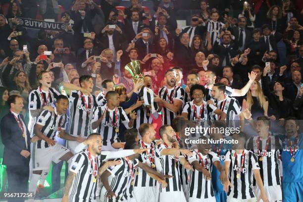 Claudio Marchisio of Juventus FC lifts the Italian Cup trophy after the final match between Juventus FC and SS Lazio at the Stadio Olimpico on May...