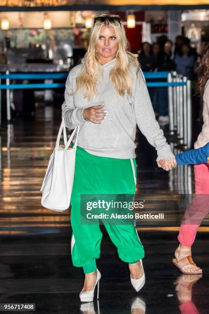 Jessica Simpson and Eric Johnson are seen at JFK Airport on May 9, 2018 in New York, New York.