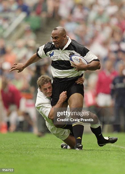 Jonah Lomu of Barbarians in action during the Scottish Amicable Tour Match between England and The Barbarians played at Twickenham in London....