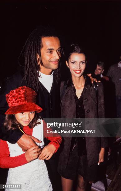 Yannick Noah et Heather Stewart-Whyte et leur fille au défil�é Hervé Léger, Prêt-à-Porter, Collection Printemps-été 1997 à Paris en octobre 1996,...