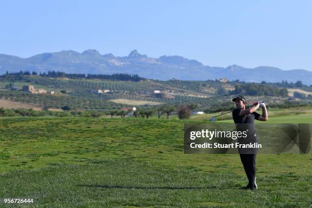 Bradley Neil of Scotland plays a shot from the rough during day one of the Rocco Forte Open at Verdura Golf and Spa Resort on May 10, 2018 in...