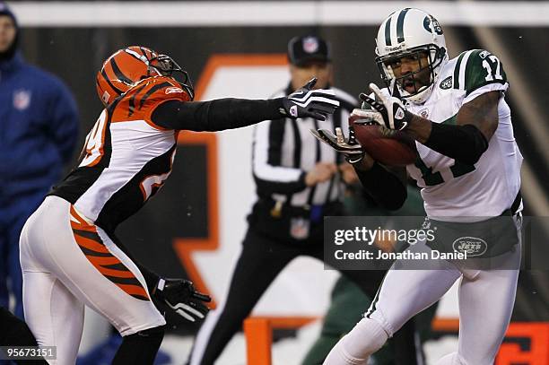 Braylon Edwards of the New York Jets drops a pass in the endzone against Leon Hall of the Cincinnati Bengals in the first half during the 2010 AFC...