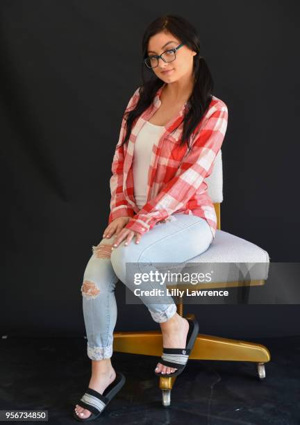 Laci Kay sittting in an Ulloo42 chair at The Artists Project Giveback Day on May 9, 2018 in Los Angeles, California.