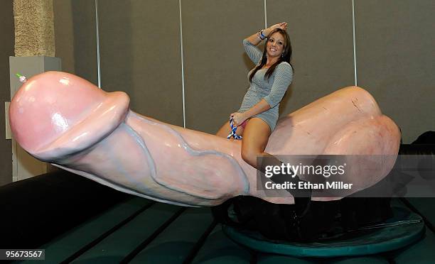 Sarah Clampitt of Maryland rides the Bucking Penis at the 2010 AVN Adult Entertainment Expo at the Sands Expo and Convention Center January 9, 2010...
