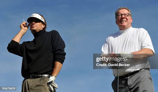 Actor Kevin Sorbo and Cary Deacon, chief executive officer of Navarre Corportation waits to tee off at the seventh hole at the 11th Annual National...