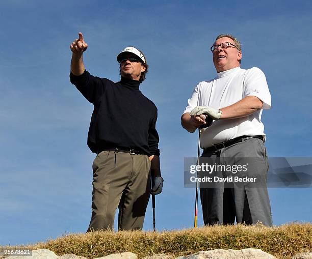 Actor Kevin Sorbo and Cary Deacon, chief executive officer of Navarre Corporation wait to tee off at the seventh hole at the 11th Annual National...