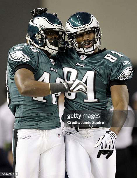 Jeremy Maclin and Jason Avant of the Philadelphia Eagles celebrate Maclin's 76-yard second quarter touchdown catch against the Dallas Cowboys during...