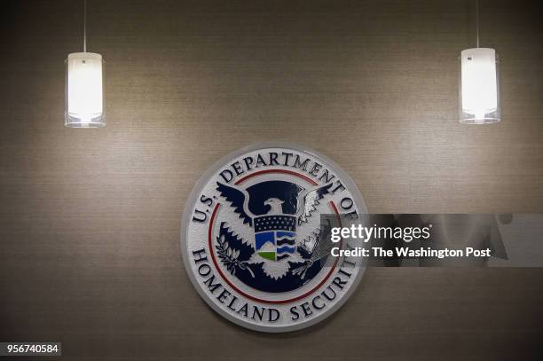 Department of Homeland Security logo is seen inside press conference room on Thursday, May 11 at the U.S. Immigration and Customs Enforcement...