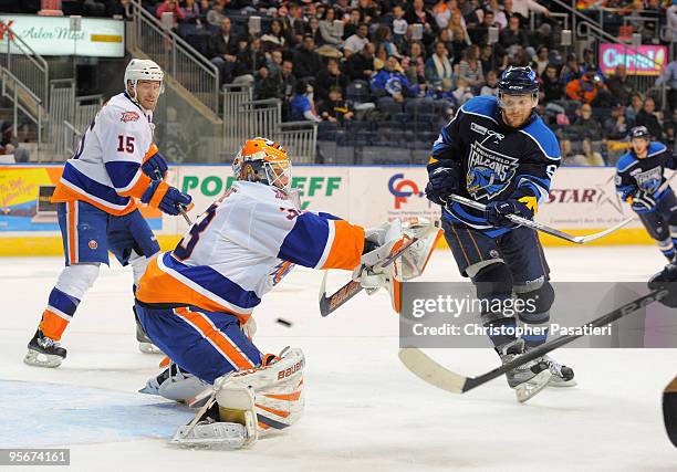 Scott Munroe of the Bridgeport Sound Tigers makes a save during the second period against the Springfield Falcons on January 9, 2010 at the Arena at...