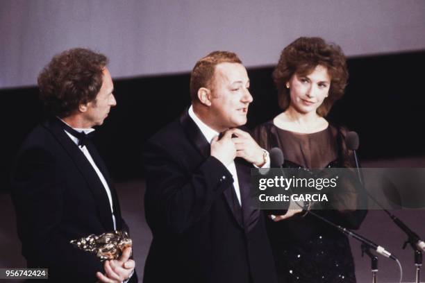 Pierre Richard, Coluche et Marlène Jobert lors de la 9ème nuits des Césars à Paris le 3 mars 1984, France.