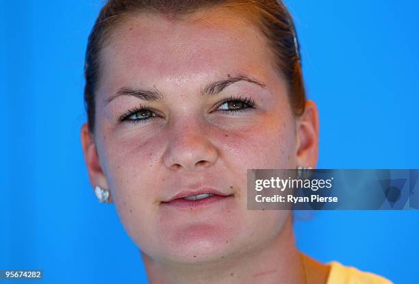 Agnieszka Radwanska of Poland looks on during an autograph session during day one of the 2010 Medibank International at Sydney Olympic Park Sports...