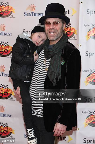 Country music singer Big Kenny Alphin and his four year old son Lincoln attend the Sprint Sound & Speed fan festival at the Nashville Municipal...