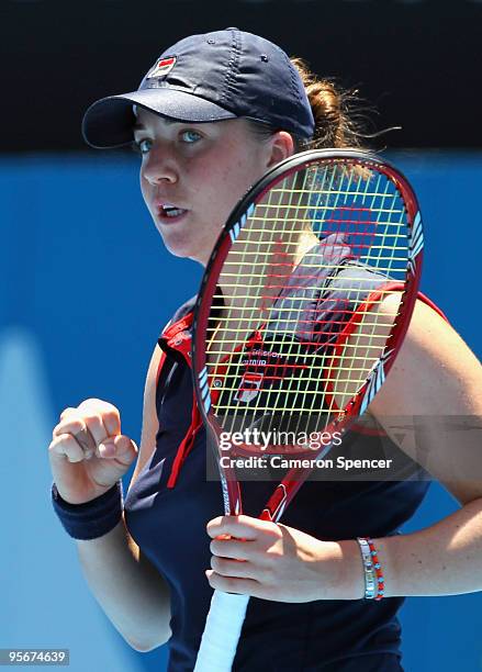 Alisa Kleybanova of Russia celebrates a point in her first round match against Svetlana Kuznetsova of Russia during day one of the 2010 Medibank...