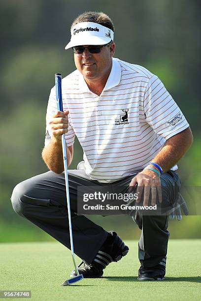 Kenny Perry looks over a putt during the third round of the SBS Championship at the Plantation course on January 9, 2010 in Kapalua, Maui, Hawaii.