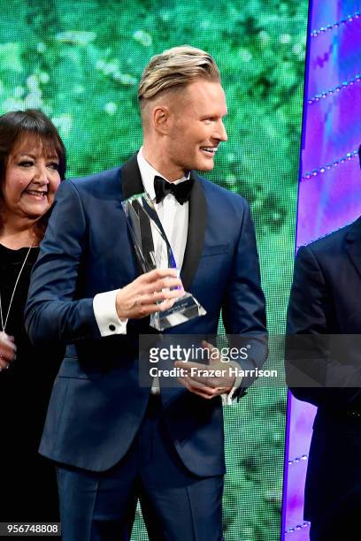 Brian Tyler accepts award onstage during 34th Annual BMI Film, TV & Visual Media Awards at Regent Beverly Wilshire Hotel on May 9, 2018 in Beverly...