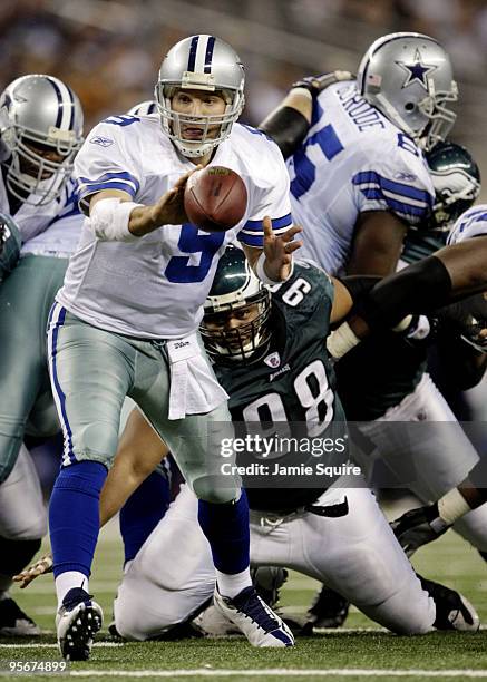 Tony Romo of the Dallas Cowboys pitches the ball in the fourth quarter against the Philadelphia Eagles during the 2010 NFC wild-card playoff game at...