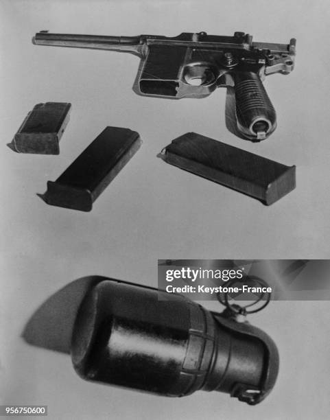 Un pistolet automatique Mauser avec ses chargeurs et une grenade à main trouvés sur Kalemen, l'assassin du roi Alexandre 1er de Yougoslvaie et Lousi...
