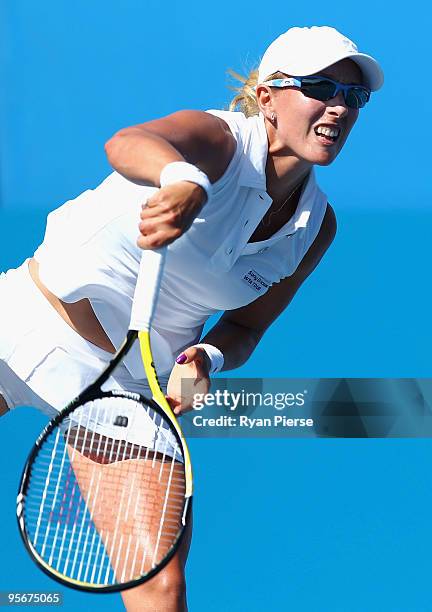 Anastasia Rodionova of Australia serves in her final qualifying round match against Kimiko Date Krumm of Japan during day one of the 2010 Medibank...