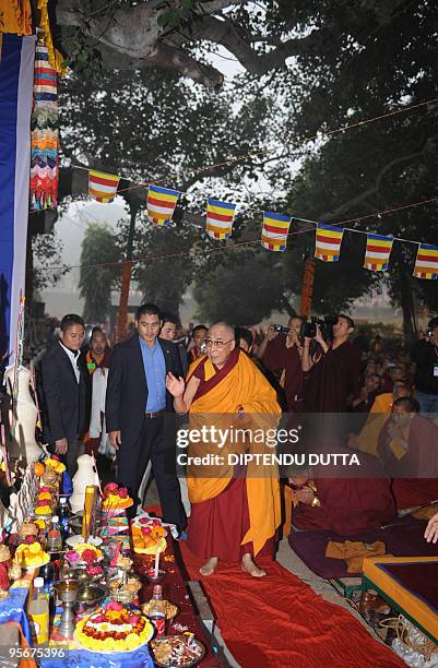 Tibetan spiritual leader The Dalai Lama prays under the Bodhi Tree, where Lord Buddha attained enlightenment during a special prayer session at The...