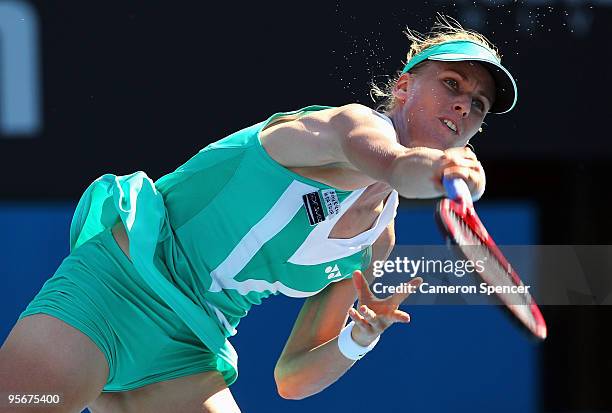 Elena Dementieva of Russia serves in her first round match against Francesca Schiavone of Italy during day one of the 2010 Medibank International at...