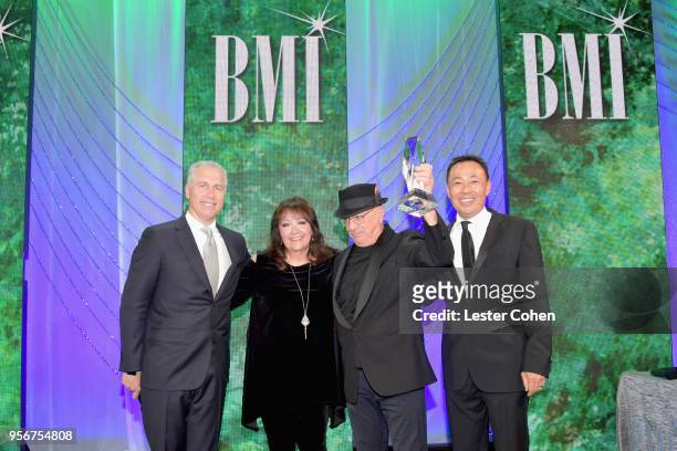 Mike Post accepts award from BMI Vice President, Creative - Film, TV & Visual Media Doreen Ringer Ross, Executive Vice President of Creative &...