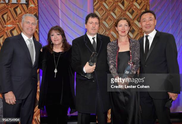 Atticus Ross and Claudia Sarne accept award from BMI Vice President, Creative - Film, TV & Visual Media Doreen Ringer Ross, Executive Vice President...