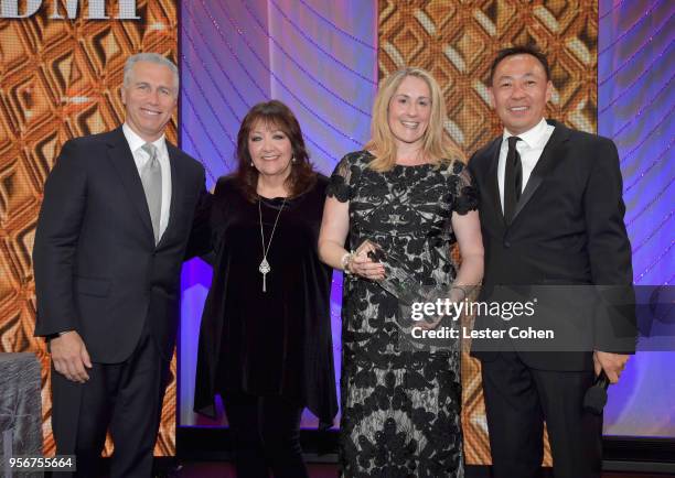 Ronit Kirchman accepts award from BMI Vice President, Creative - Film, TV & Visual Media Doreen Ringer Ross, Executive Vice President of Creative &...