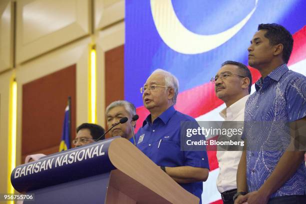 Najib Razak, Malaysia's outgoing prime minister, third right, speaks during a news conference at the Barisan Nasional coalition headquarters in Kuala...