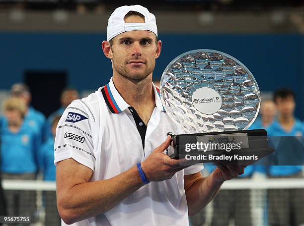 Andy Roddick of the USA poses with the trophy after winning his final match against Radek Stepanek of the Czech Republic during day eight of the...