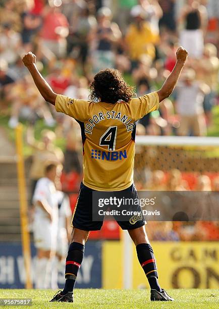 Nikolai Topor-Stanley of the Jets celebrates his team's third goal during the round 22 A-League match between the Newcastle Jets and Melbourne...