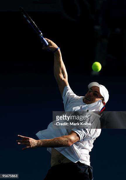 Andy Roddick of the USA stretches to hit the ball in the men's final against Radek Stepanek of the Czech Republic during day eight of the Brisbane...