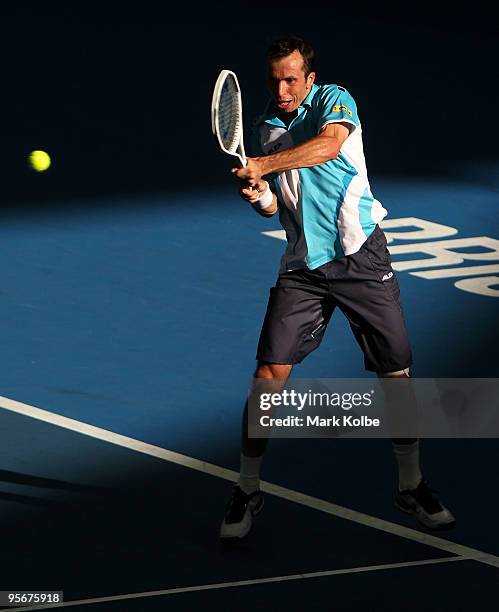 Radek Stepanek of the Czech Republic plays a backhand in the men's final match against Andy Roddick of the USA during day eight of the Brisbane...