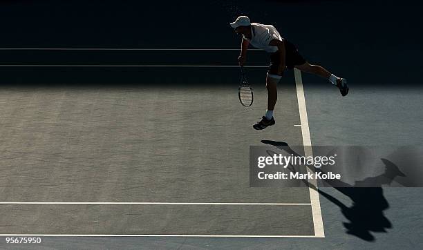Andy Roddick of the USA serves in the men's final against Radek Stepanek of the Czech Republic during day eight of the Brisbane International 2010 at...