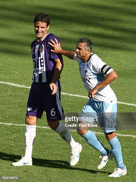 Steve Corica of Sydney gives Chris Coyne of the Glory a shove of Sydney during the round 22 A-League match between Perth Glory and Sydney FC at ME...