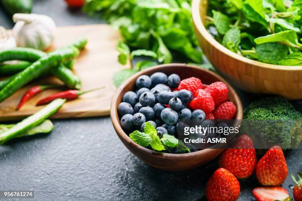 mixed berries - leaf vegetable stock pictures, royalty-free photos & images
