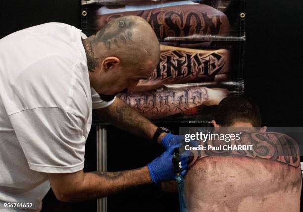 Corps tatoué au Mondial du Tatouage dans la Grande Halle de la Villette le 4 mars 2016.Paris, France.