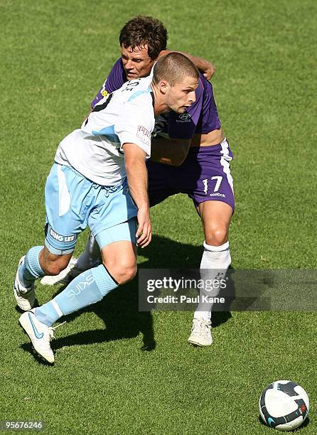 Shannon Cole of Sydney in action against Todd Howarth of the Glory during the round 22 A-League match between Perth Glory and Sydney FC at ME Bank...