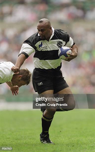 Jonah Lomu of Barbarians in action during the Scottish Amicable Tour Match between England and The Barbarians played at Twickenham in London....