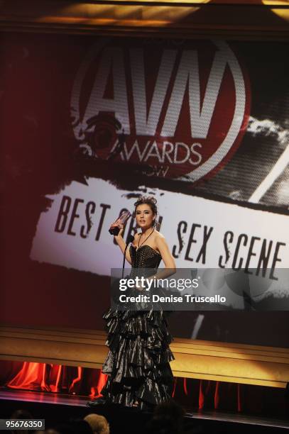 Sasha Grey accepts and award at the 2010 AVN Awards at the Pearl at The Palms Casino Resort on January 9, 2010 in Las Vegas, Nevada.