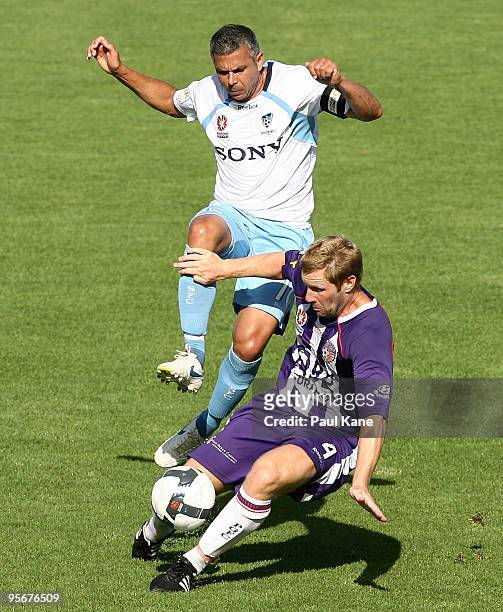 Steve Corica of Sydney and Andy Todd of the Glory contest the ball during the round 22 A-League match between Perth Glory and Sydney FC at ME Bank...