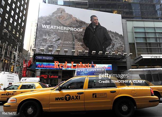 The Weatherproof Garment Company's billboard hangs in Times Square in New York on January 7, 2010 featuring a photograph of US President Barack Obama...