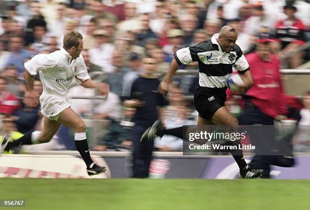 Jonah Lomu of Barbarians in action during the Scottish Amicable Tour Match between England and The Barbarians played at Twickenham in London....