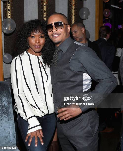 Angela Bassett and T.I. Attend The Stevie Wonder Song Party at The Peppermint Club on May 9, 2018 in Los Angeles, California.