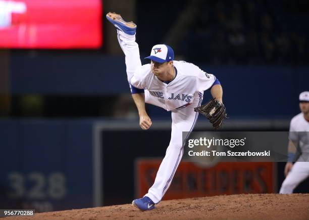 Jake Petricka of the Toronto Blue Jays delivers a pitch in the seventh inning during MLB game action against the Seattle Mariners at Rogers Centre on...