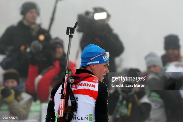 Michael Greis of Germany looks dejected after the Men's 15 km mass start in the e.on Ruhrgas IBU Biathlon World Cup on January 10, 2010 in Oberhof,...