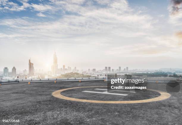 empty helicopter parking in nanjing city - helipad stock pictures, royalty-free photos & images