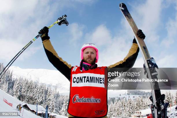 Xavier Kuhn of France celebrates after winning the FIS Freestyle World Cup Men's Ski Cross on January 9, 2010 in Les Contamines, France.