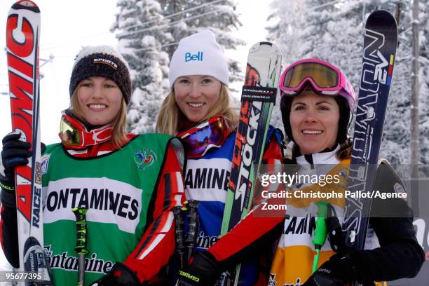 Ashleigh McIvor of Canada takes 1st place, Julia Murray of Canada takes 2nd place, Karin Huttary of Austria takes 3rd place during the FIS Freestyle...