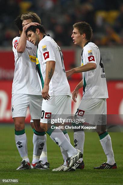 Raúl Marcelo Bobadilla of Moenchengladbach celebrates the first goal with Jan-Ingwer Callsen-Bracker and Patrick Herrmann during the Wintercup match...