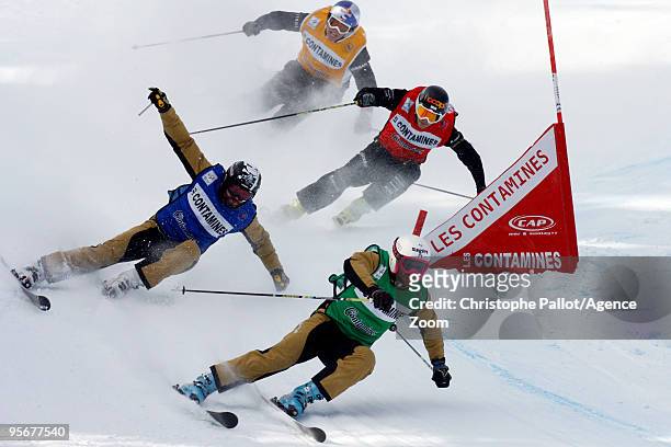 Xavier Kuhn of France skis on his way to taking 1st place and Tomas Kraus of the Czech Republic skis on his way to taking 3rd place during the FIS...